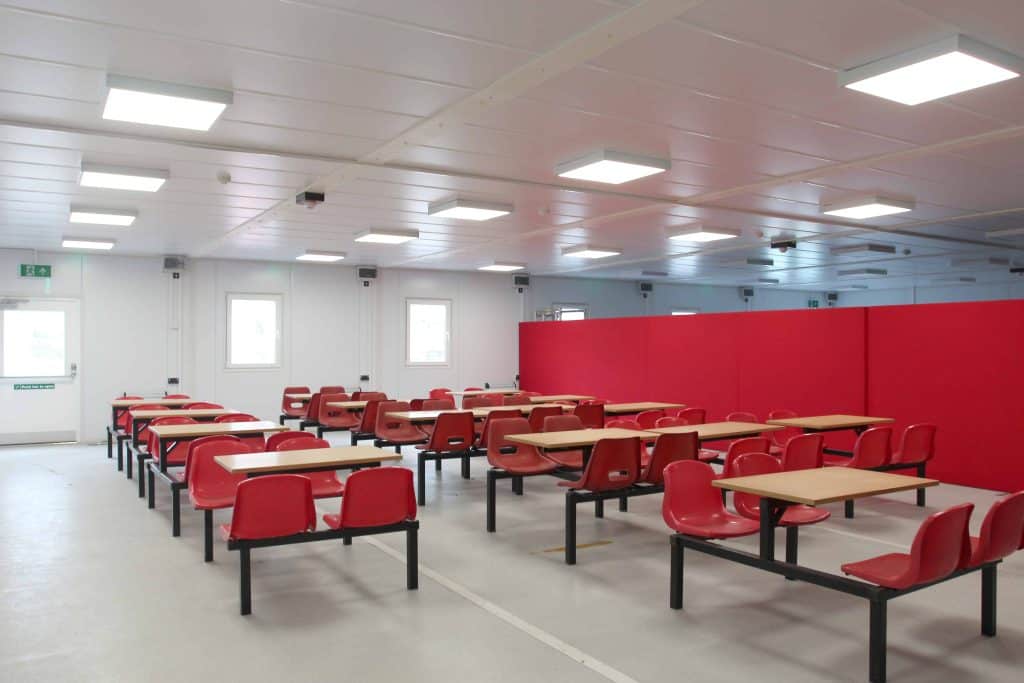 Inside view of cafeteria facility. Inside modular building for John Sisk 