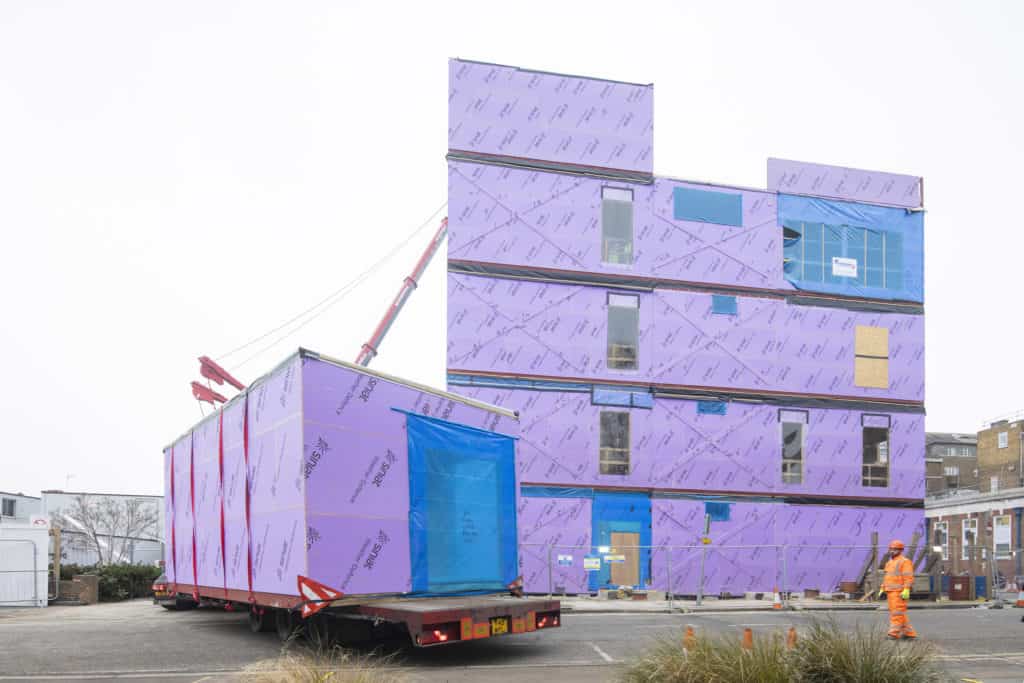 Modular units being constructed for the healthcare sector. Hospital rooms that've been built off-site being put together on-site.