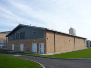 Back angle of a two storey modular prison facility.