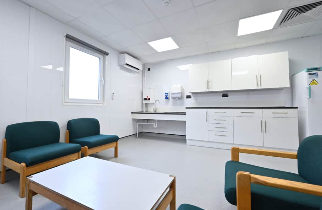 View of seating area inside modular healthcare units