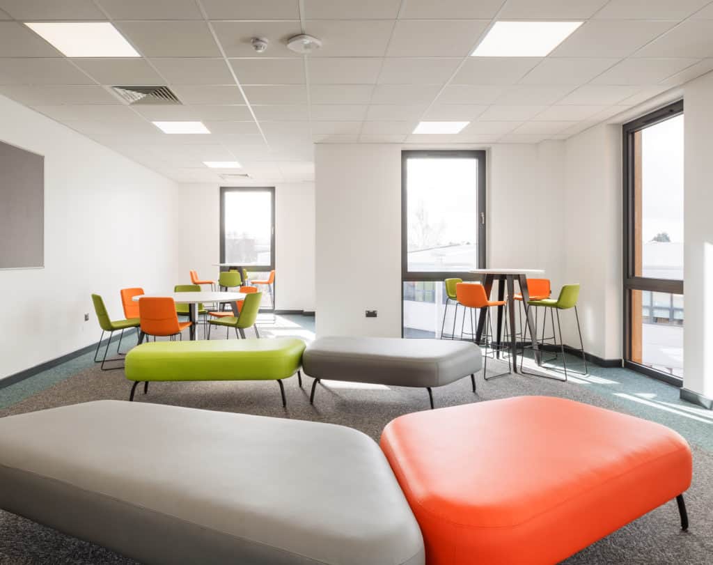 Inside modular classroom breakout spaces for independent work at Leeds City College.