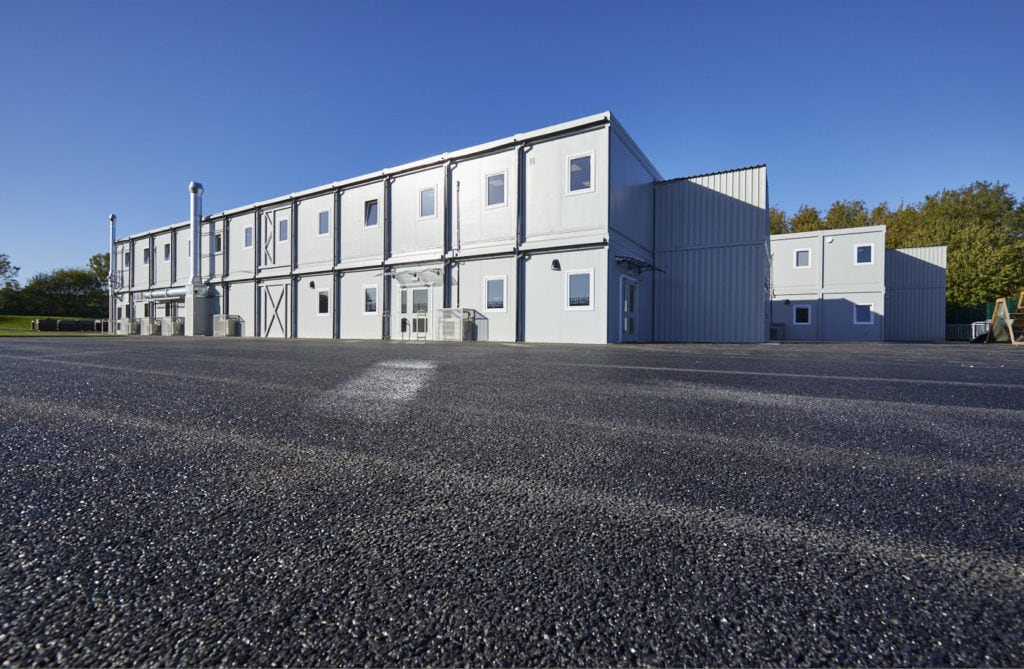 Front view of temporary school building built for Bradsfield Academy