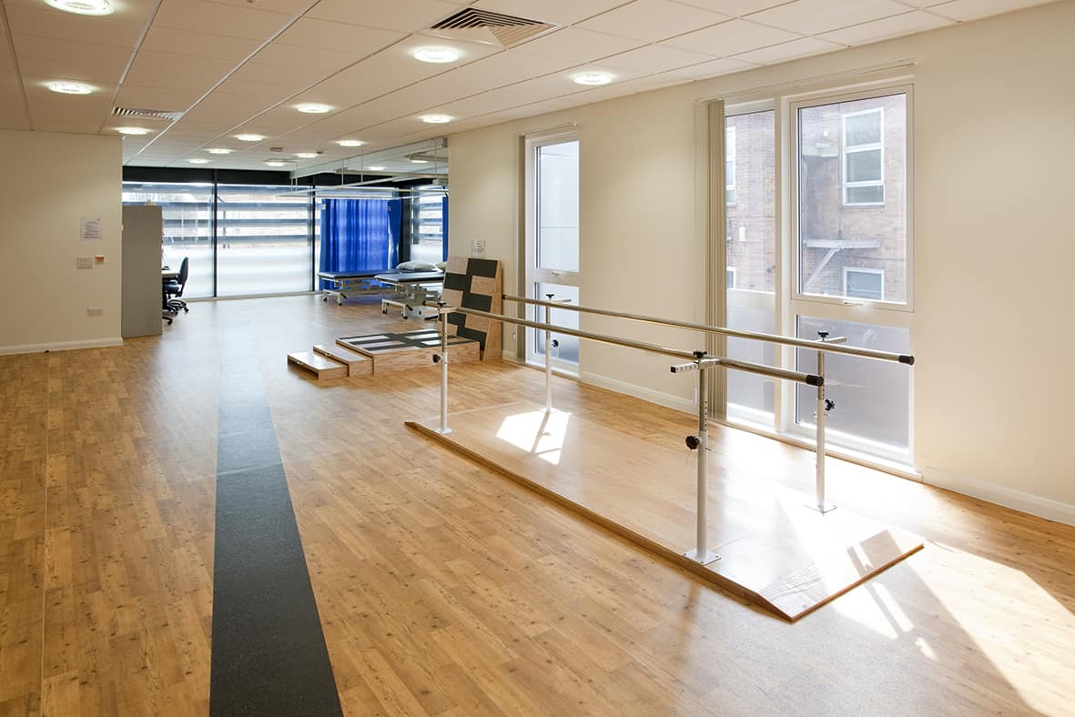 Physical therapy equipment inside a modular hospital room. 