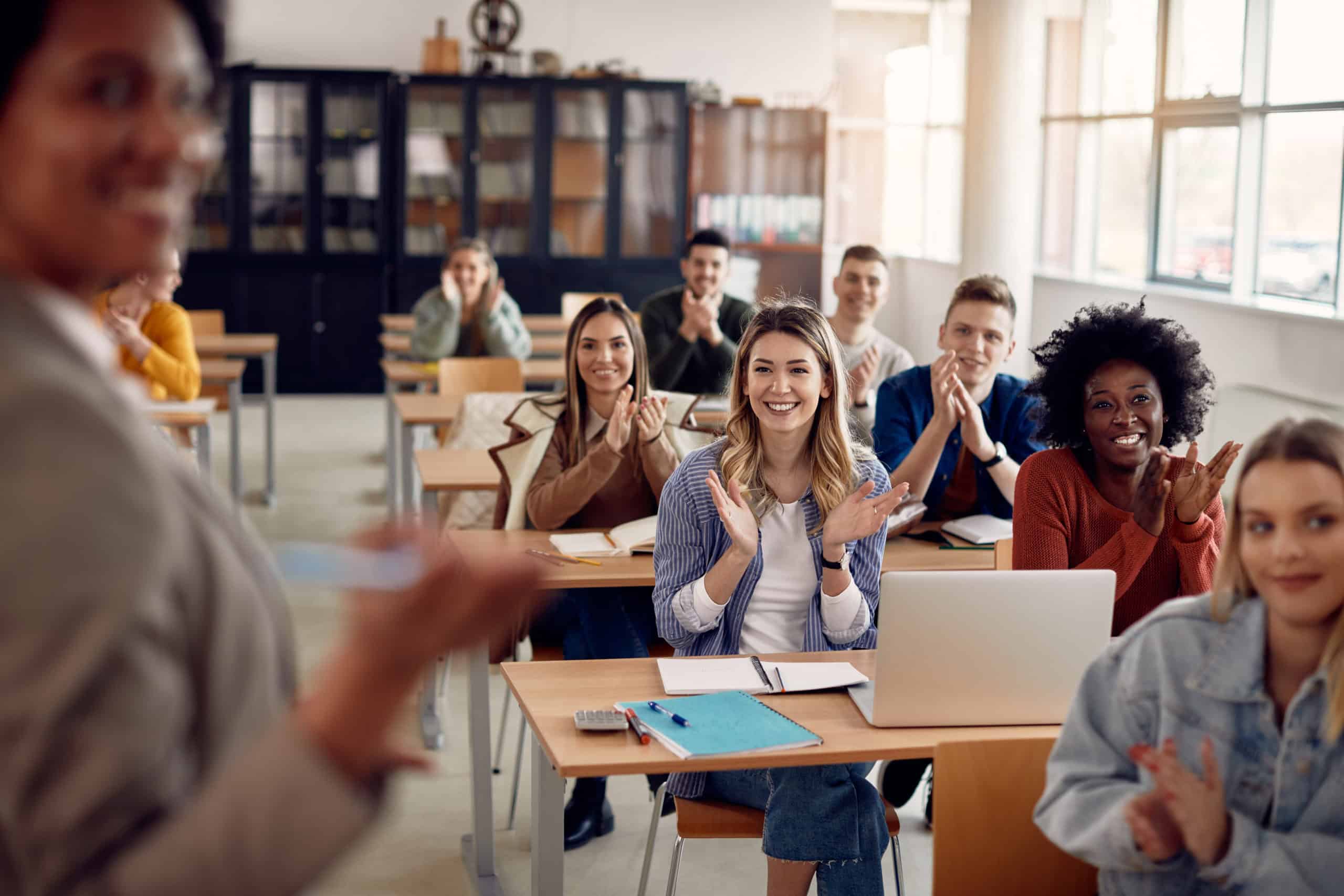 Group,Of,Happy,Students,Applauding,To,Their,Lecturer,While,Attending