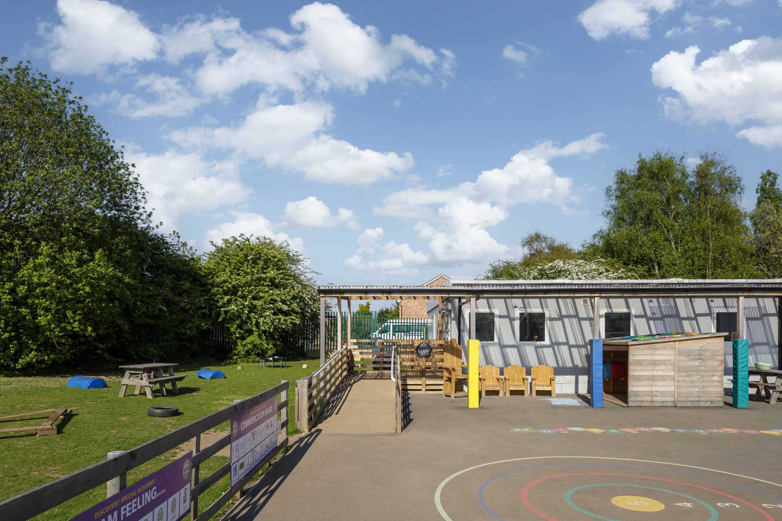Playground. Ramp with accessibility for wheelchairs up to the temporary classrooms. 