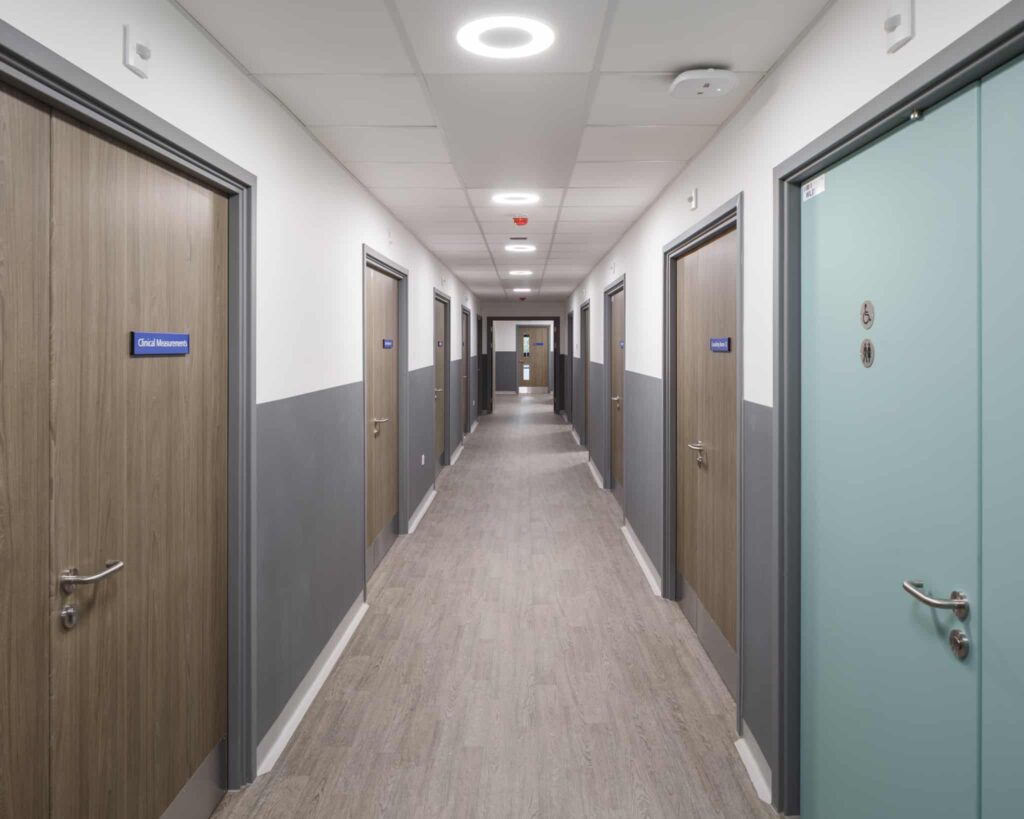 Hospital corridor, empty. Inside view of a modular building for the healthcare sector. 